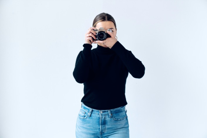 Bild einer Frau mit Kamera